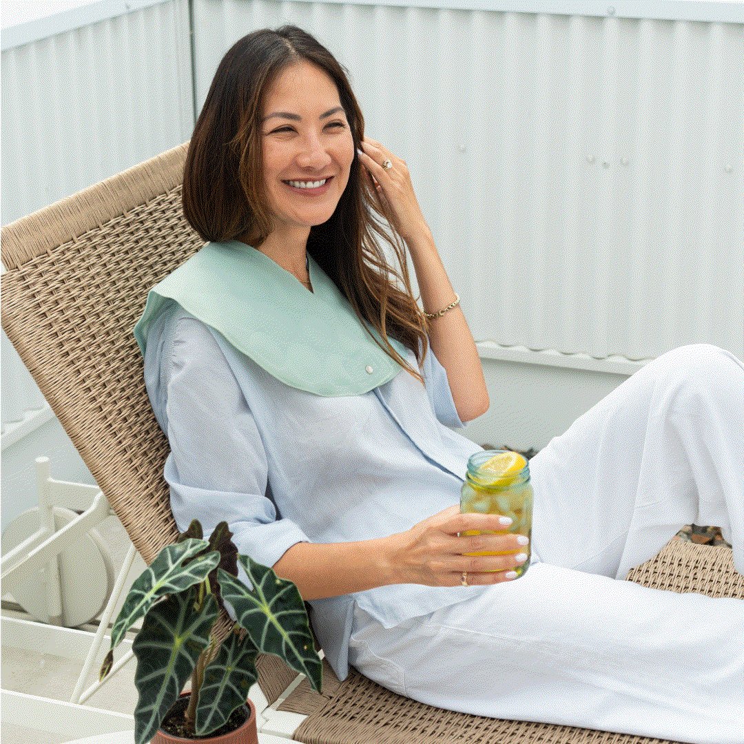 Hot Flash Cape Lifestyle Woman on Outdoor Seating