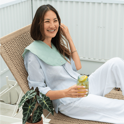 Hot Flash Cape Lifestyle Woman on Outdoor Seating