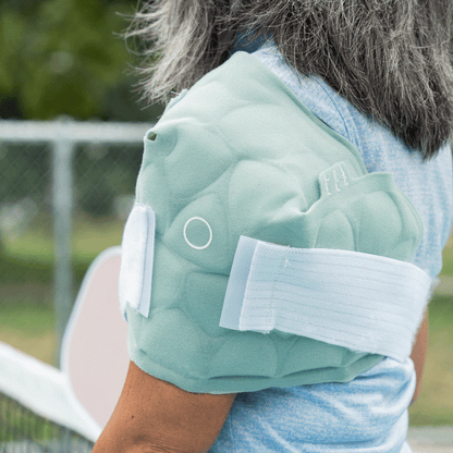joint power move on woman shoulder with grey hair