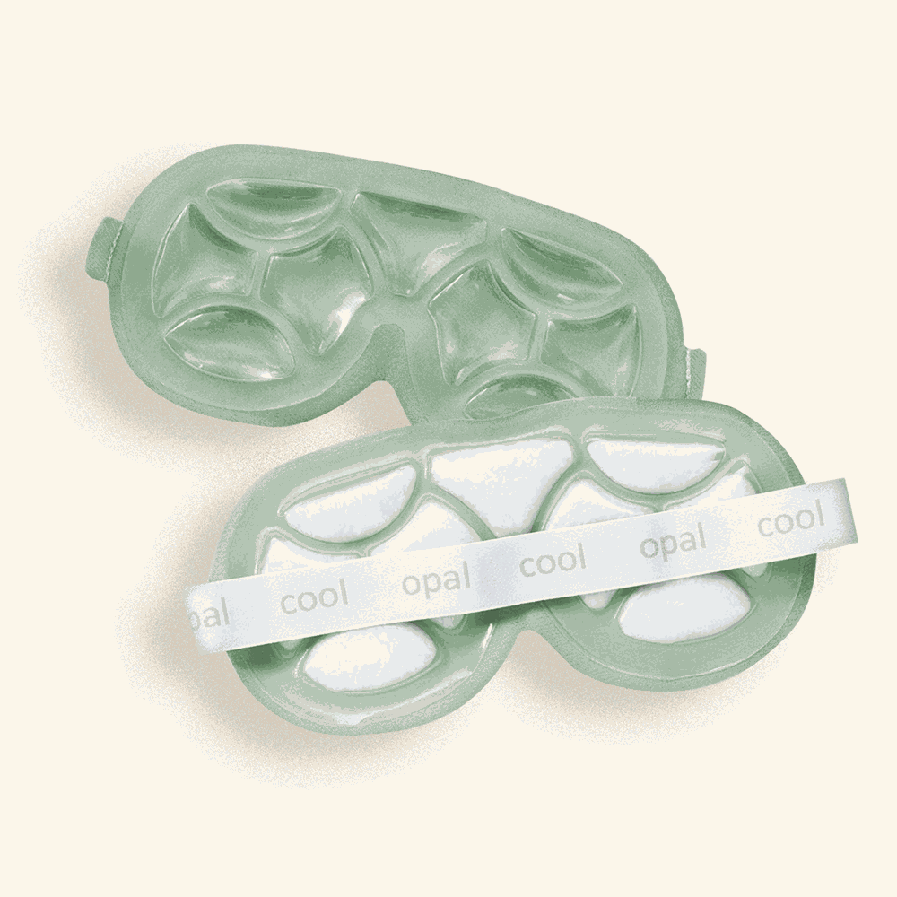 Cooling eye mask with white cooling pods on a beige background